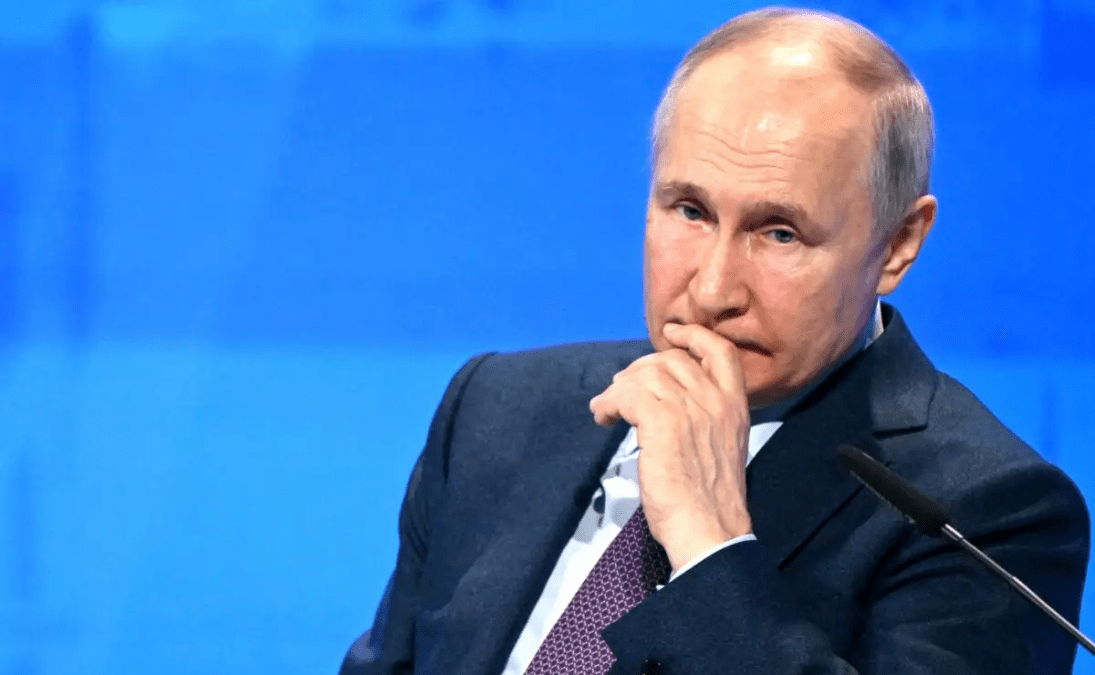 путін